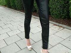 A Diva walking in leather pants
