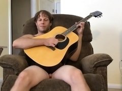 Nude Hairy Stud Guitar Playing
