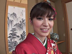 Yuria Tominaga in a kimono gets things stuffed in her pussy